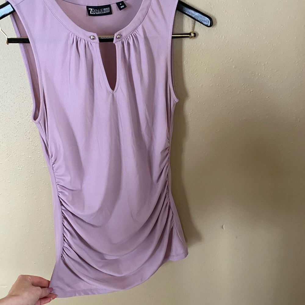 Light purple New York & Company shirt.